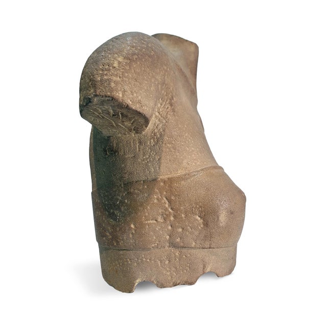 Veiled Beauty, a sandstone torso by Veit Korn, is a mesmerizing exploration of the female form, sculpted from green reed...