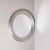 Round Mirror with Satin Aluminum Frame by Sergio Mazza for Artemide, 1960s, in Good conditions. Designed 1960 to 1969 This...