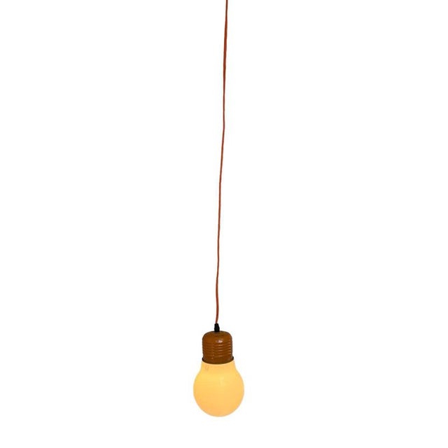 Vintage lamp in the shape of an oversized bulb. This idea is nothing new and has been accredited to may designers and...
