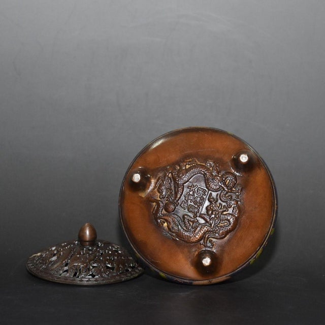 Enhance your space with the serene presence of this vintage cloisonné enamel incense burner. This finely crafted censer...