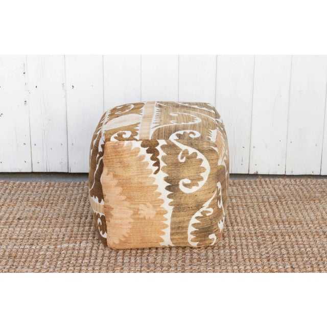 Our collection of Suzani ottomans offers a unique way to incorporate timeless beauty into your home. Suzani embroidery,...