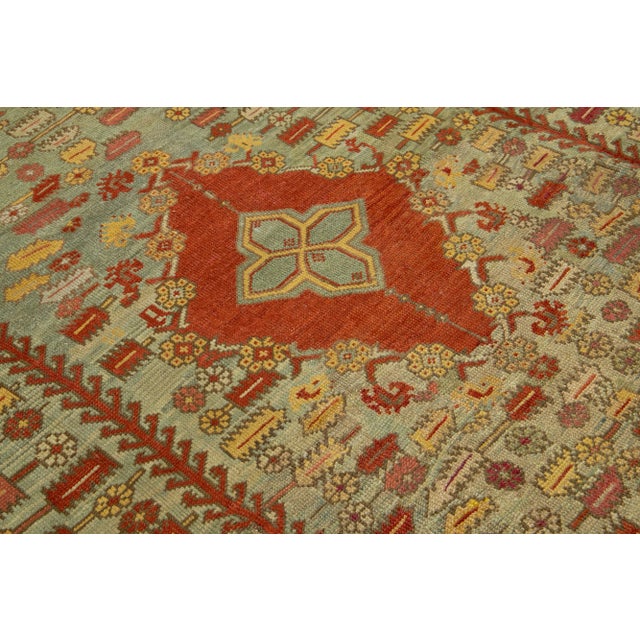 Blue 1880s Turkish Oushak Antique Wool Rug in Blue Featuring a Medallion Design For Sale - Image 8 of 10