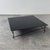 Minimalist Black Glass Coffee Table with Industrial Metal Base For Sale - Image 4 of 11