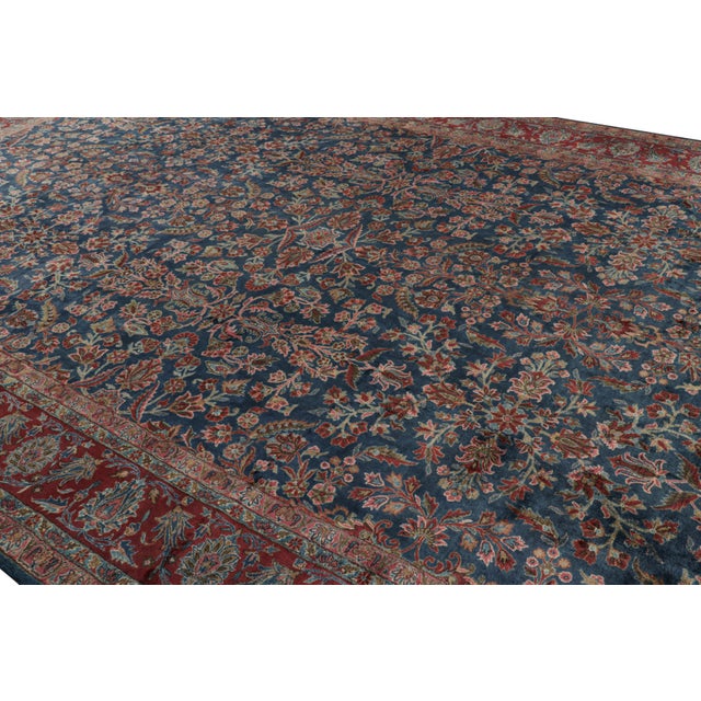 Hand-knotted in wool circa 1910-1920, this 11x17 oversized rug is a rare antique Persian rug of Kashan provenance, among...