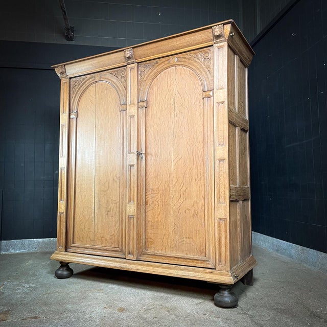 This wardrobe is handmade from oak and has its origins in Germany, around 1680. The cupboard still has its original lock...