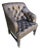 Experience the Height of Classic Luxury With This Leather Chesterfield Chair With Elegant Brass Nailhead Trim. For Sale