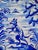 A charming vintage Spanish Talavera-style ceramic wall plate, hand-painted in traditional cobalt blue and white with a...