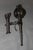 Pair of medieval-style wrought iron wall sconces signed Reboulet, wiring in good condition, 20th century, set in very good...