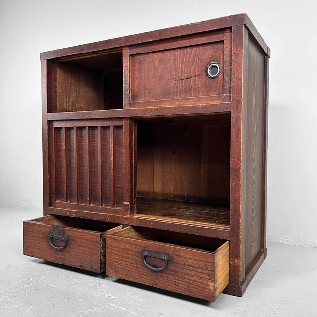 Japanese traditional storage cabinet from the Meiji period. Dimensions: Height 77.5 cm, Width 78 cm, Depth 38 cm. This...
