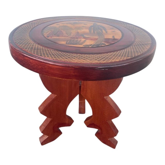 Beautiful vintage hand-carved wood pedestal featuring an island scene design. Perfect as a display stand for plants, art,...