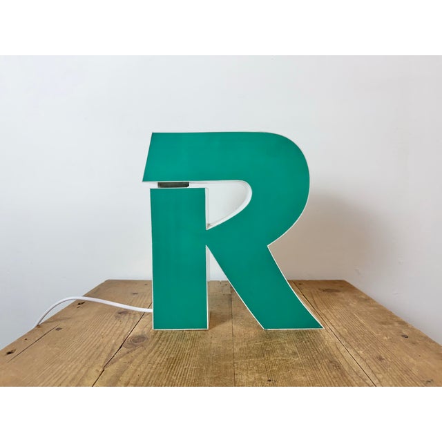 This vintage industrial illuminated letter “ R “ was made in Italy during the 1970s and comes from an old advertising...