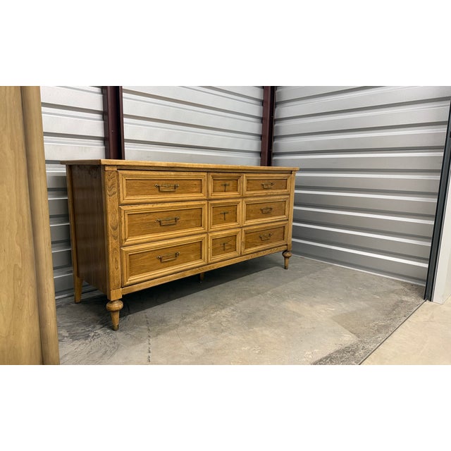 Nine-drawer dresser by White Furniture Company of Mebane, North Carolina — the oldest furniture manufacturer in the state,...