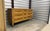 Nine-drawer dresser by White Furniture Company of Mebane, North Carolina — the oldest furniture manufacturer in the state,...