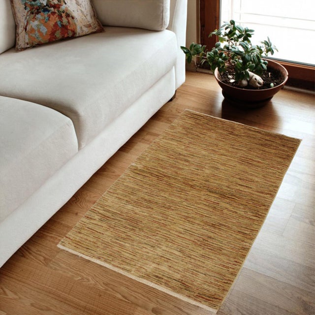 Transform your home's interior with a stunning hand-knotted Gabbeh rug. These rugs are meticulously crafted with bold...