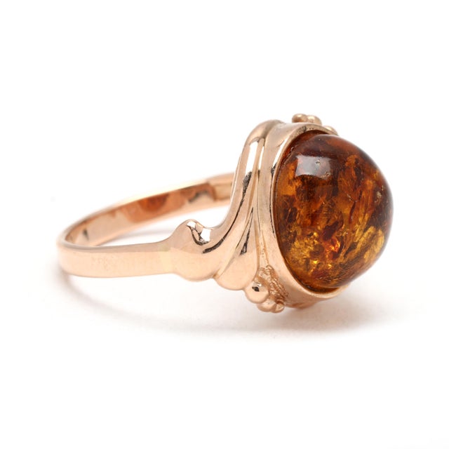 Stones: amber, 1 round cab Ring Size: 5 Rise off of Finger: 7.4 mm Length: 12.1 mm Weight: 2 dwts. / 3.1 grams Stamps: 9k...