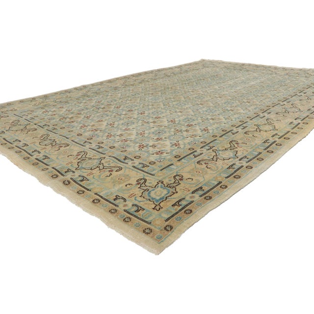 51543 Antique Persian Mashhad Rug 06'03 X 09'08. This hand-knotted wool antique Persian Mashhad rug features an allover...