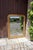 Louis Philippe mirror, 19th century. Its frame is entirely gilded with gold leaf. It has a beautiful and luminous patina....