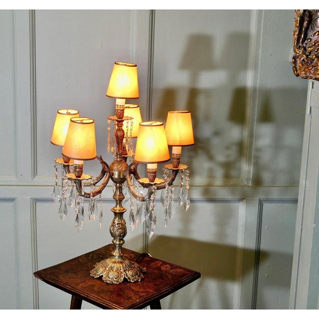 French Brass and Crystal 6 Branch Chandelier Table Lamp, Girandole This is a rare and stunningly attractive piece, the...