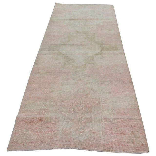 Hand-knotted with care using traditional rug-making techniques, this wool rug blends timeless craftsmanship with a modern...