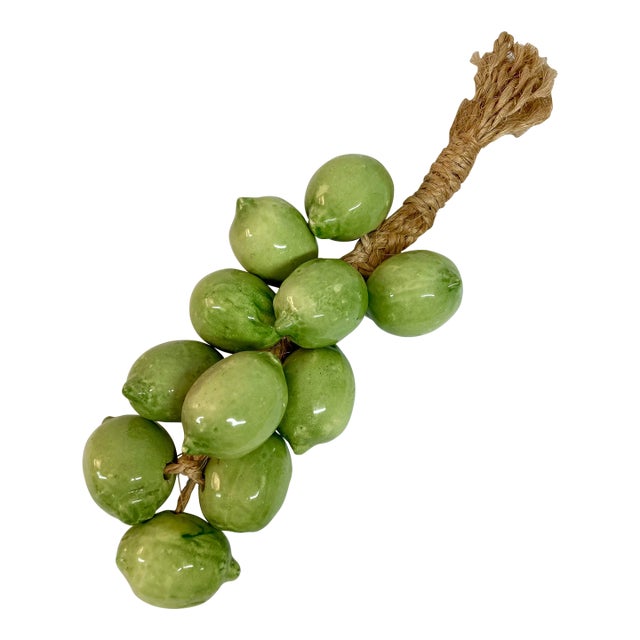 Italian Ceramic Glazed Green Limes on Straw For Sale