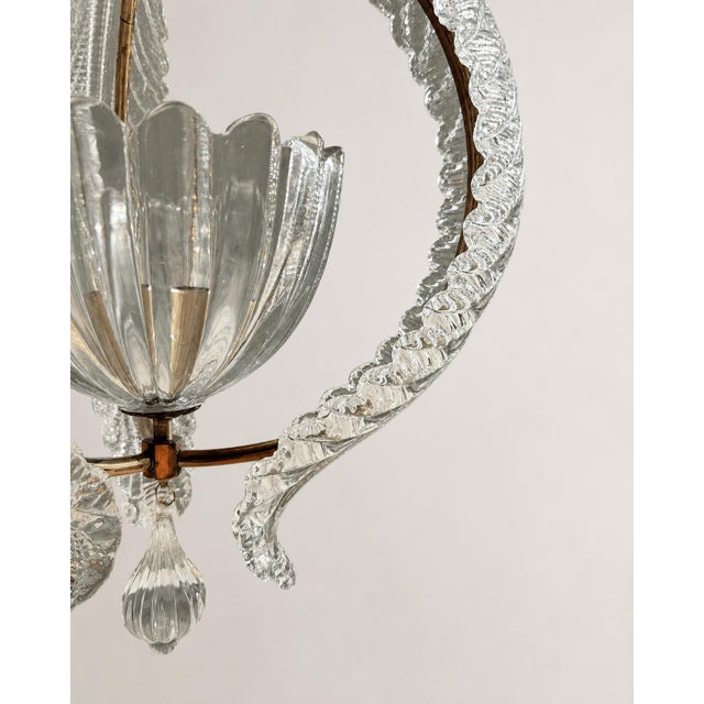 An exceptional mid-century Italian pendant light designed and produced by the prestigious Venetian glasshouse Barovier &...