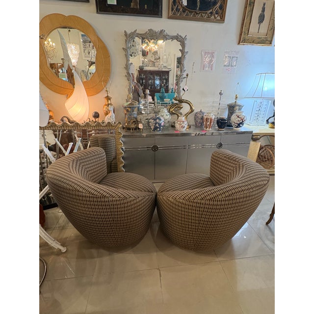 Vintage pair of Vladimir Kagan Nautilus Corkscrew swivel chairs. These have their as found upholstery which is in great...