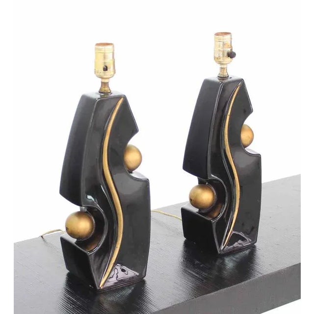 Picasso style pair of ceramic table lamps. Perfect for the living room space.