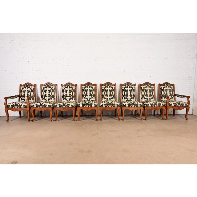 An outstanding set of eight French Rococo or French Provincial Louis XV style dining chairs By Baker Furniture USA, Circa...