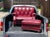 This handsome vintage red leather club chair set is unmarked but high quality. It's a red tufted leather English roll arm...
