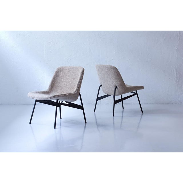 Rare pair of Swedish lounge chairs designed by Hans-Harald Molander, manufactured by Nordiska Kompaniet during the 1950s....