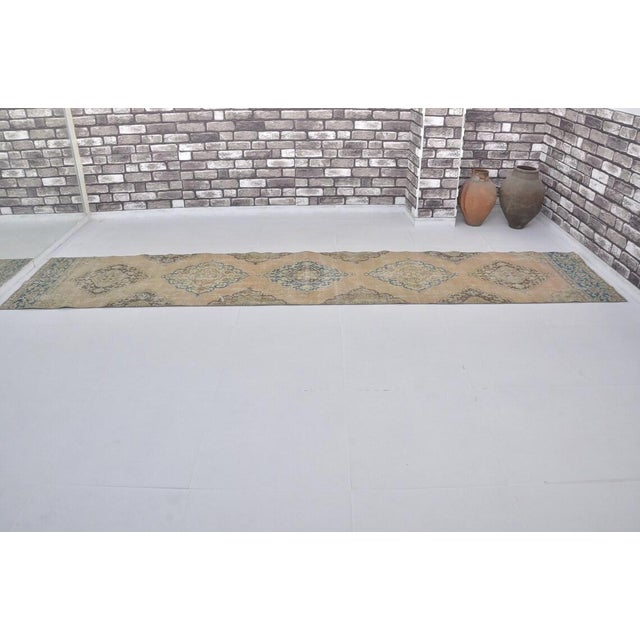 Turkish Vintage Distressed Turkish Oushak Long Hallway Runner Rug With Muted Medallions - 3x14 For Sale - Image 3 of 10