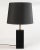 A wonderful petite marble table lamp after T.H. Robsjohn Gibbings for Hansen, New York with a well chosen piece of black...