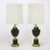 Elegant pair of neoclassical table lamps from Lightolier with spun brass caps, risers and base. Also, dark green lacquered...
