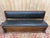 Large solid walnut storage bench, napoleon iii period, second half of the 19th century. the structure comprises a chest...