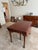 This is a solid cherry wood dining table by Carl Forslund of Grand Rapids MI. It features an oval top with several leaves,...