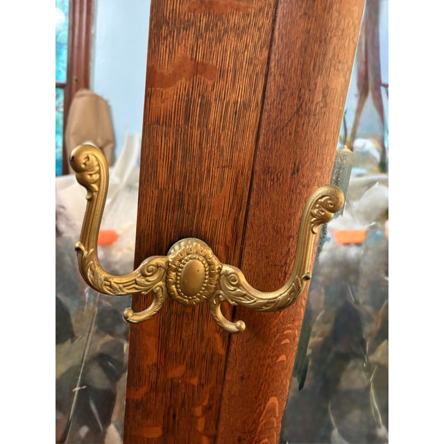 Turn-of-the-Century Victorian Carved Oak Hall Tree Bench With Original Brass Hardware & Mirror For Sale - Image 9 of 12