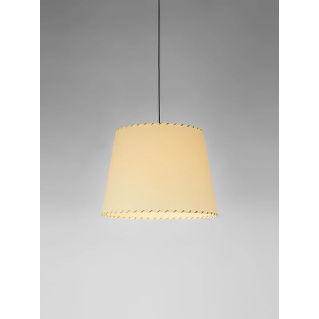 Beige sísísí cónicas gt3 pendant lamp by santa & cole dimensions: d 36 x h 27 cm materials: metal, stitched parchment....