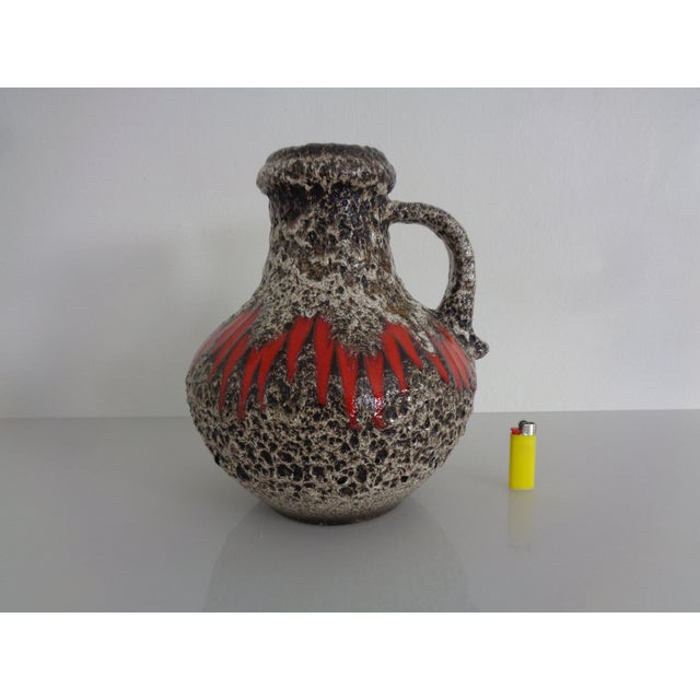 Ceramic handled vase by Scheurich in very good condition. This piece has an attribution mark, I am sure that it is...