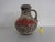 Ceramic handled vase by Scheurich in very good condition. This piece has an attribution mark, I am sure that it is...