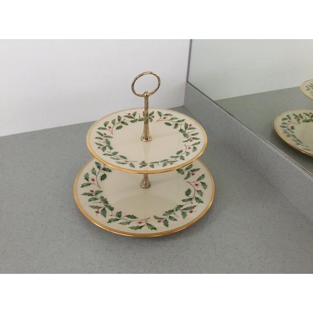 Your famous holiday cookies never looked so good. Crafted of porcelain and gold, this two-tiered serving platter is the...