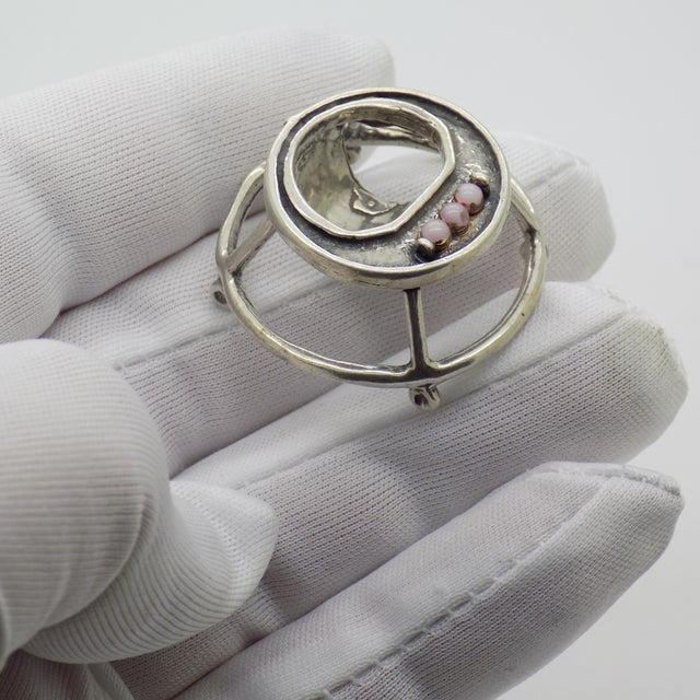 A lovely vintage miniature depicting a baby walker, handmade in Arezzo, Tuscany, Italy between the 1970s and 1980s in...