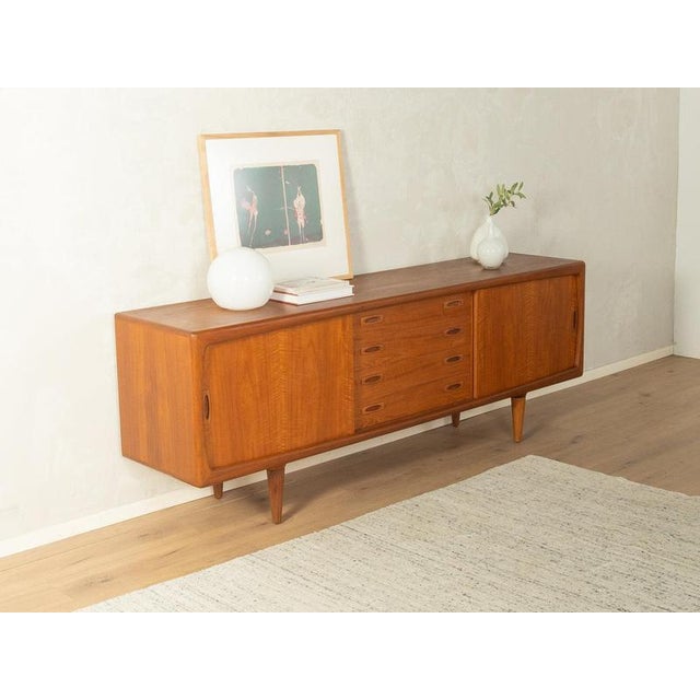 1960s Sideboard, H.P. Hansen Exquisite design: perfect proportions and a clear attention to detailhigh-quality...