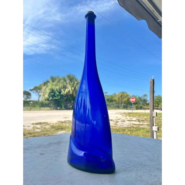 This is a vintage 19-inch tall Italian cobalt blue wine bottle with cork. The GIANT Italia Garganega Pinot Grigio cobalt...