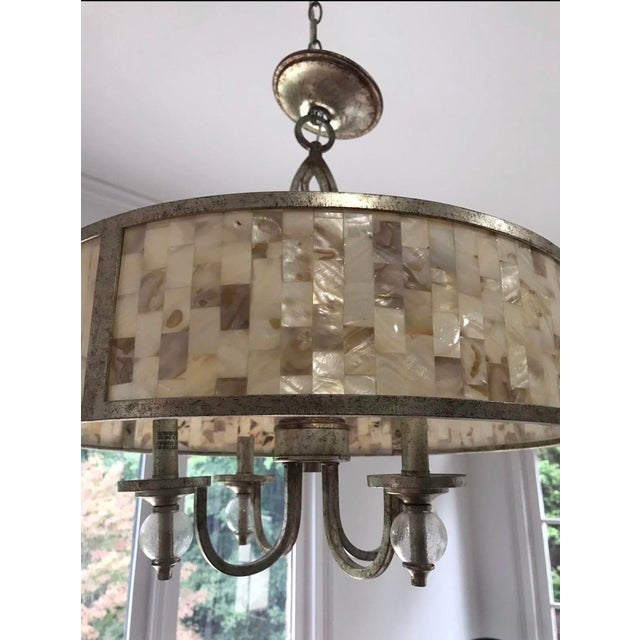 Raymond Waites Acacia Penshell 4 light pendant. Oxidized Champagne/ Silver Finish. 120 Volt. 15.80 Lbs.