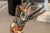 A vibrant and imaginative folk-art sculpture by Detroit artist Willie Leroy Elliot Jr., titled "Wolf Bench". Created circa...