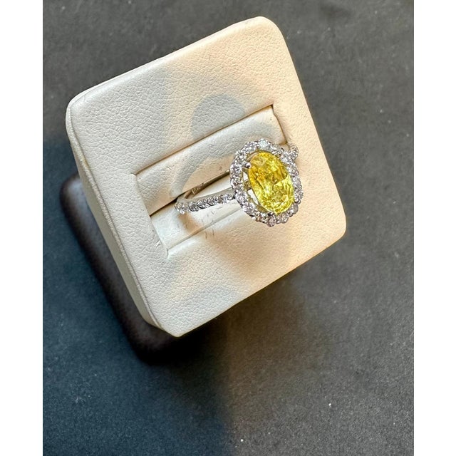 2020s 2.2 Ct Oval Cut Natural Yellow Sapphire & Diamond Halo Engagement Ring For Sale - Image 5 of 8