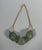 Maison LALIQUE - Marie-Claude LALIQUE "Nerita" Model, created in 1995 Necklace featuring a twisted gold chain adorned with...