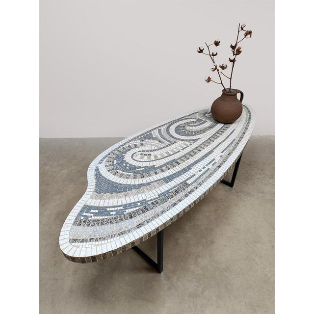 What a beauty, this unique mosaic vintage design coffee table/side table from the 1970s. Country of origin: Germany. This...