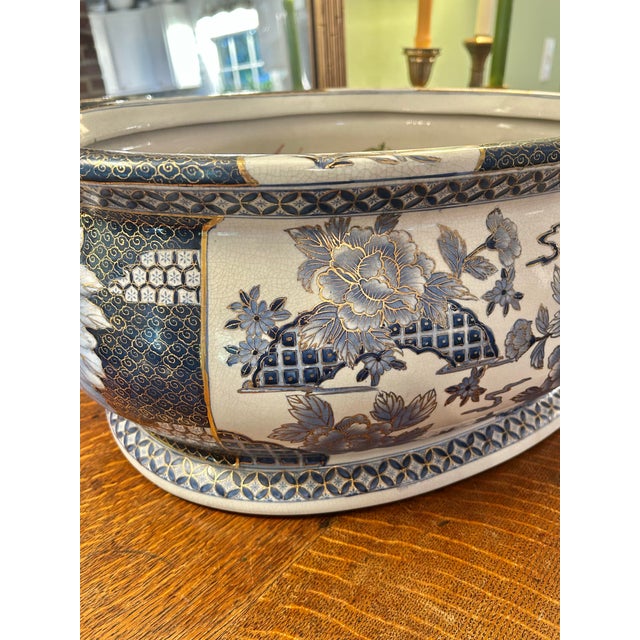 This piece is stunning in size and design. For the lover of all things chinoiserie, this foot bath is blue and white in an...
