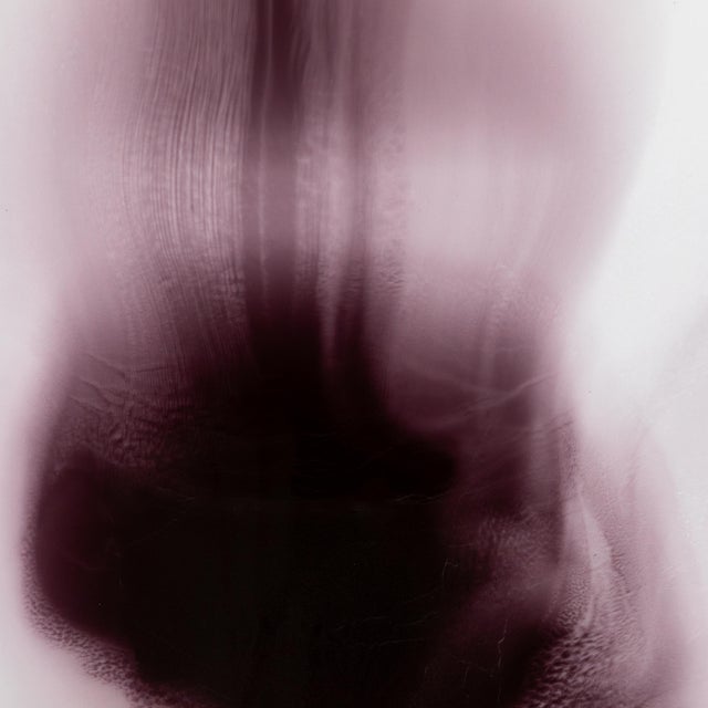 From the series e·the·re·al, this work captures a moment suspended between materiality and dissolution. A deep violet form...